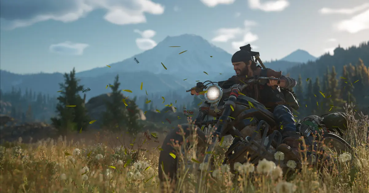 Deacon St. John rijdt op zijn zwaar gemodificeerde drifter bike door een weelderig maar gevaarlijk bos in de Pacific Northwest in Days Gone.