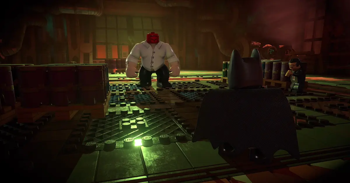 Batman voert een tegenaanval uit op een straatcrimineel in LEGO Batman Legacy of the Dark Knight