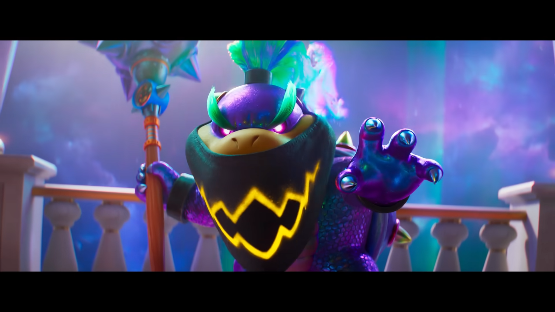 Bowser Junior kijkt in de camera met zijn penseel